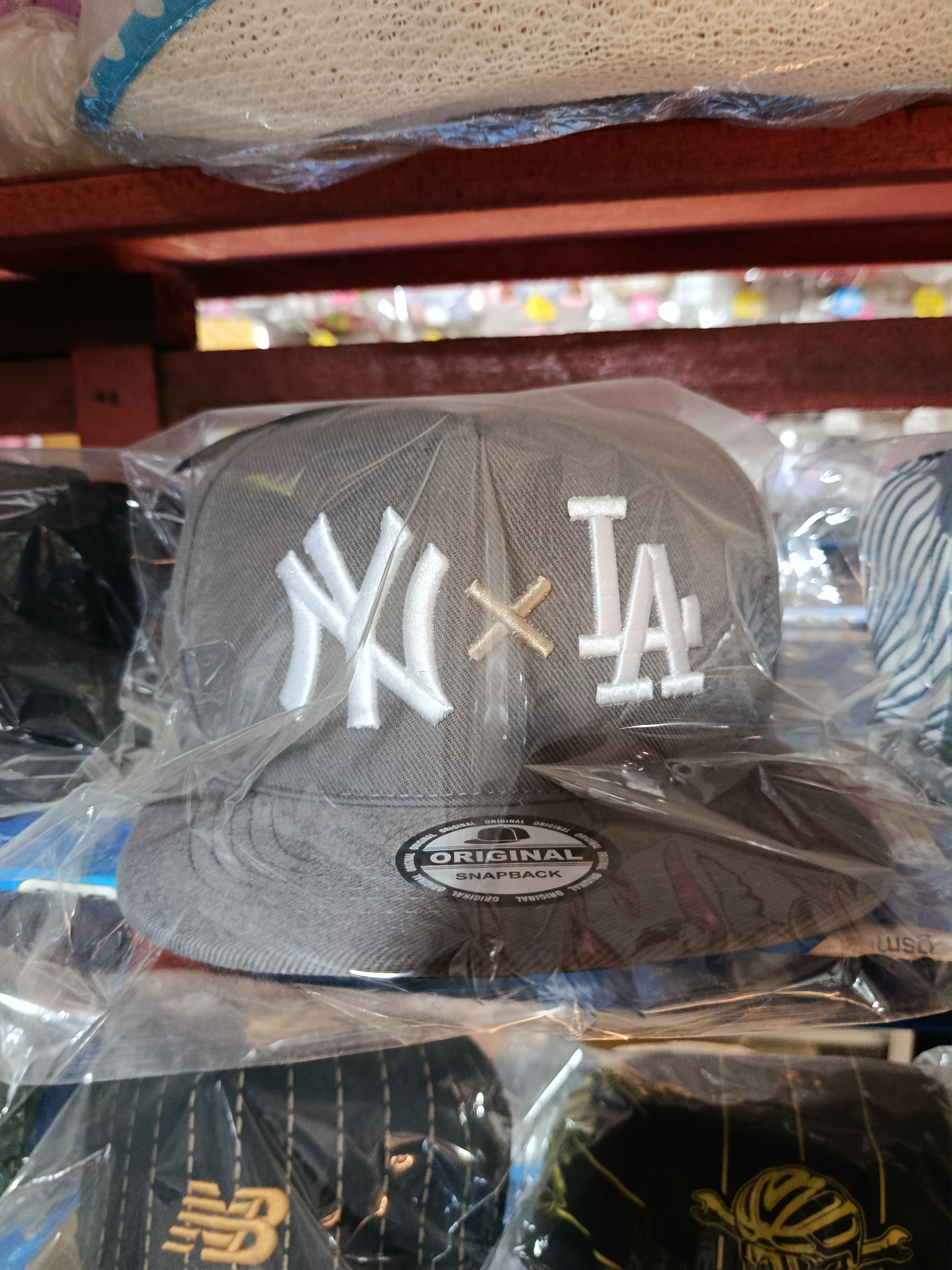 Topi Snapback NY × LA Premium